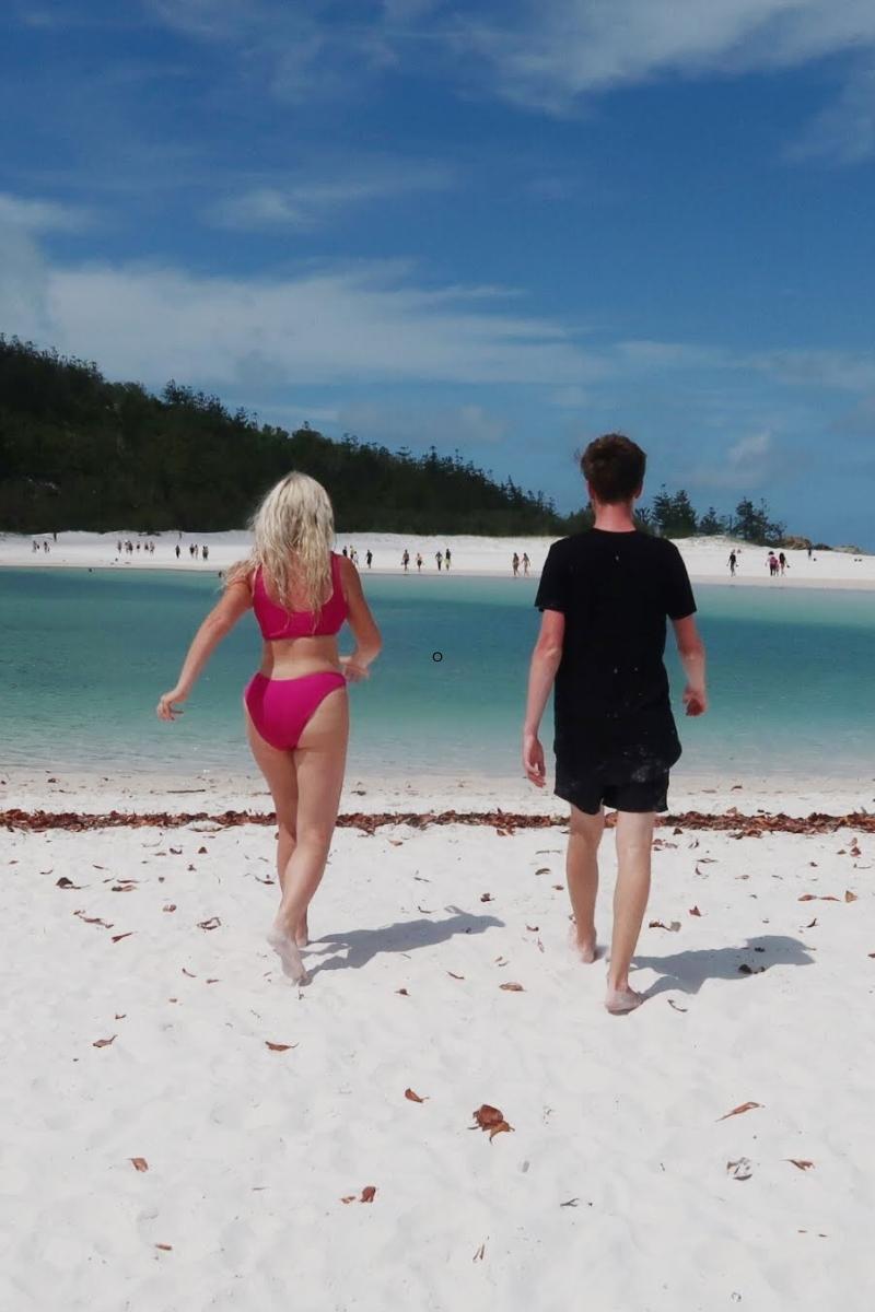whitehaven beach running on the sand